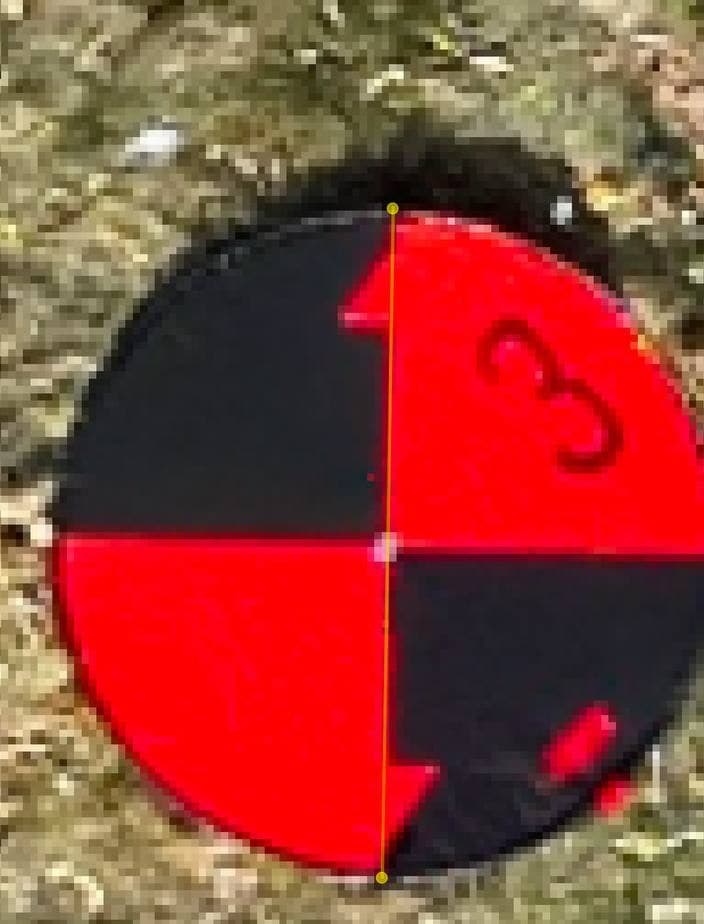 Aerial detail of a verified ground control point measured at 36.07 inches